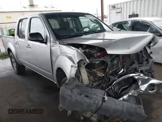 2006 Nissan Frontier LE with VIN 1N6AD07U06C436191, listed as a IAAI auction lot 41560700 with 185,712 mi miles and . Bid and sale history available at DreamBid. Image 1.