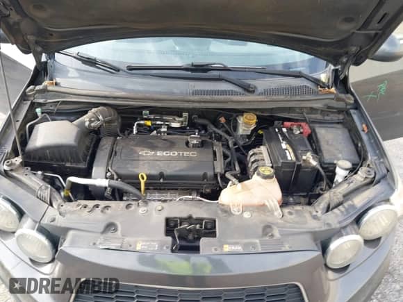 2016 Chevrolet Sonic LT z VIN 1G1JC5SH9G4157517, wystawiony jako IAAI lot #43096087 z przebiegiem 122 808 mil mil oraz . Historia ofert i sprzedaży dostępna na DreamBid. Obrazek 10.