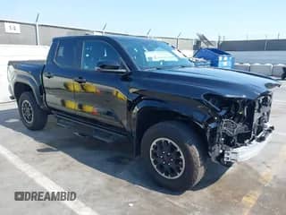 2024 Toyota Tacoma SR5 with VIN 3TMLB5JNXRM041924, listed as a IAAI auction lot 42943677 with 13,623 mi miles and . Bid and sale history available at DreamBid. Image 1.