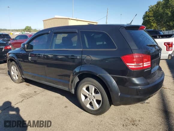 2009 Dodge Journey SXT with VIN 3D4GG57V29T237780, listed as a Copart auction lot 85690795 with 82,843 mi miles and Salvage title. Bid and sale history available at DreamBid. Image 2.