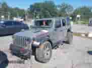 2021 Jeep Wrangler Unlimited Rubicon with VIN 1C4HJXFG3MW579324, listed as a IAAI auction lot 43143653 with 38,657 mi miles and . Bid and sale history available at DreamBid. Image 17.