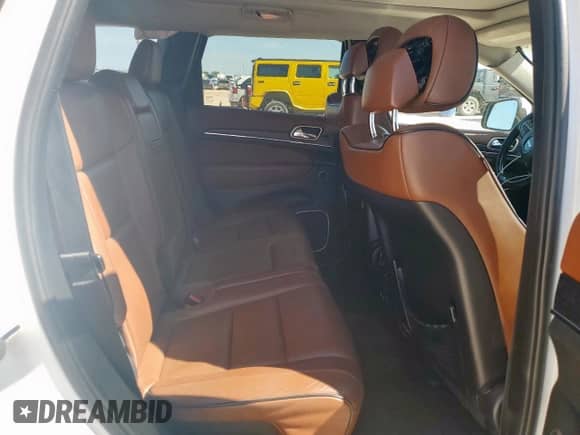 2015 Jeep Grand Cherokee Summit с VIN 1C4RJFJT7FC863594, выставлен на аукционе Copart как лот 66836465 с пробегом 146 951 миль миль и Списание • Salvage title. История ставок и продаж доступна на DreamBid. Изображение 11.