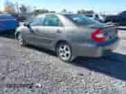 2002 Toyota Camry LE with VIN 4T1BF30K92U506041, listed as a IAAI auction lot 43467428 with 268,439 mi miles and . Bid and sale history available at DreamBid. Image 3.