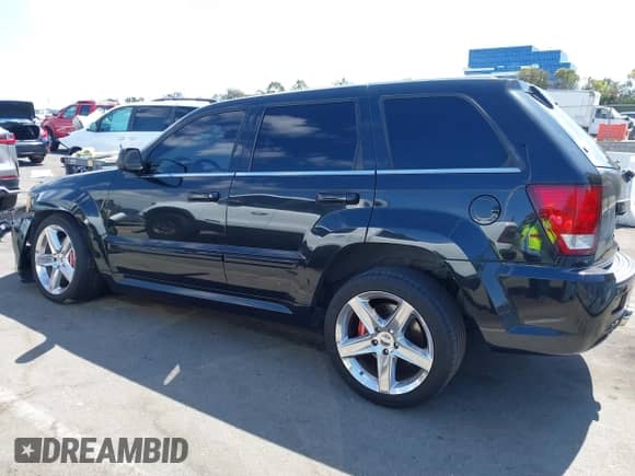2009 Jeep Grand Cherokee with VIN 1J8HR78W89C520526, listed as a IAAI auction lot 43193483 with 102,738 mi miles and . Bid and sale history available at DreamBid. Image 15.