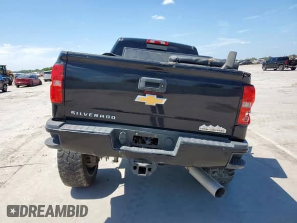 2018 Chevrolet Silverado 2500HD High Country с VIN 1GC1KXEY9JF101557, выставлен на аукционе Copart как лот 65374345 с пробегом Не указан миль и Списание • Salvage title. История ставок и продаж доступна на DreamBid. Изображение 6.