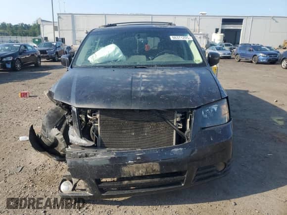 2009 Dodge Grand Caravan SXT with VIN 2D8HN54179R658097, listed as a Copart auction lot 66371205 with 254,202 mi miles and Salvage title. Bid and sale history available at DreamBid. Image 5.