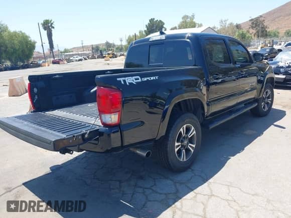 2017 Toyota Tacoma SR5 with VIN 3TMAZ5CN0HM050582, listed as a IAAI auction lot 42140264 with Not provided miles and . Bid and sale history available at DreamBid. Image 4.