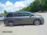 2014 Toyota Sienna SE with VIN 5TDXK3DC8ES443113, listed as a IAAI auction lot 42735795 with 235,269 mi miles and . Bid and sale history available at DreamBid. Image 14.