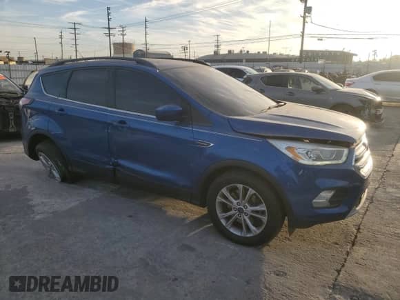 2017 Ford Escape SE с VIN 1FMCU9G9XHUA11145, выставлен на аукционе Copart как лот 86125734 с пробегом 106 846 миль миль и Чистый • Clean title. История ставок и продаж доступна на DreamBid. Изображение 4.