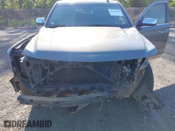 2019 Chevrolet Suburban Premier with VIN 1GNSCJKC3KR129739, listed as a IAAI auction lot 42044708 with 105,771 mi miles and . Bid and sale history available at DreamBid. Image 6.