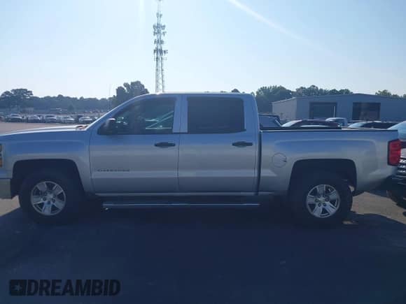 2014 Chevrolet Silverado 1500 LT with VIN 3GCPCREHXEG259073, listed as a IAAI auction lot 43010013 with 128,000 mi miles and . Bid and sale history available at DreamBid. Image 14.