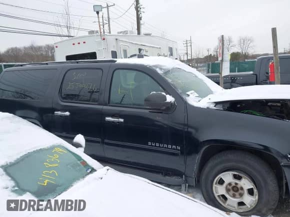 2010 Chevrolet Suburban LS with VIN 1GNUKHE37AR203811, listed as a IAAI auction lot 41304431 with Not provided miles and . Bid and sale history available at DreamBid. Image 12.