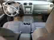 2012 Chevrolet Colorado 1LT z VIN 1GCHTCFE5C8167717, wystawiony jako Copart lot #70923195 z przebiegiem 161 738 mil mil oraz Szkoda całkowita • Salvage title. Historia ofert i sprzedaży dostępna na DreamBid. Obrazek 8.
