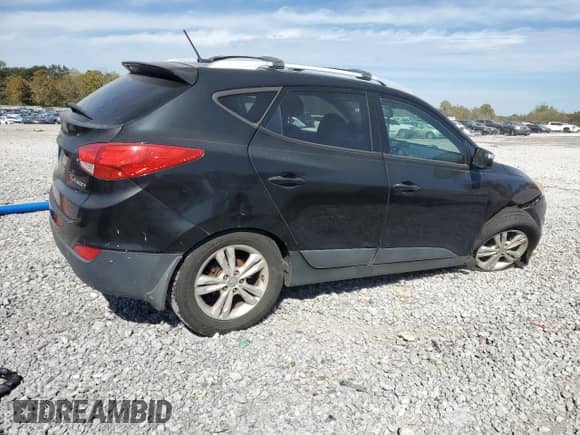 2012 Hyundai Tucson GLS with VIN KM8JU3AC0CU496915, listed as a Copart auction lot 82651635 with 220,566 mi miles and Salvage title. Bid and sale history available at DreamBid. Image 3.