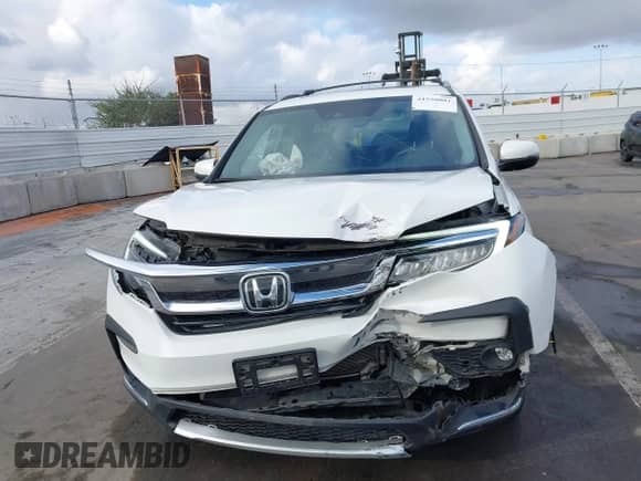 2022 Honda Pilot Elite с VIN 5FNYF6H02NB043594, выставлен на аукционе IAAI как лот 41550081 с пробегом 56 323 миль миль и . История ставок и продаж доступна на DreamBid. Изображение 12.