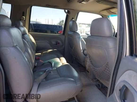 1999 Chevrolet Suburban z VIN 1GNFK16R9XJ318663, wystawiony jako IAAI lot #43358644 z przebiegiem 197 845 mil mil oraz . Historia ofert i sprzedaży dostępna na DreamBid. Obrazek 8.