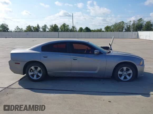 2014 Dodge Charger SE z VIN 2C3CDXBG9EH192983, wystawiony jako IAAI lot #43553133 z przebiegiem 124 512 mil mil oraz . Historia ofert i sprzedaży dostępna na DreamBid. Obrazek 12.