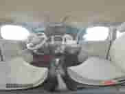 2010 Nissan Cube SL с VIN JN8AZ2KR1AT167604, выставлен на аукционе Copart как лот 56735215 с пробегом 169 416 миль миль и Списание • Salvage title. История ставок и продаж доступна на DreamBid. Изображение 15.