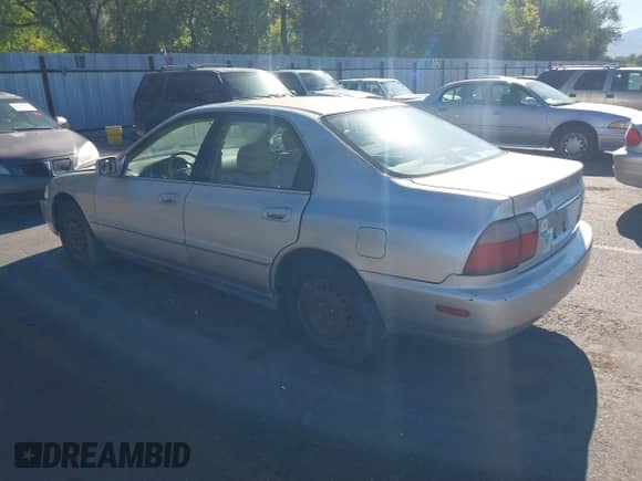 1997 Honda Accord Special Edition with VIN 1HGCD5601VA236102, listed as a IAAI auction lot 43285179 with 249,942 mi miles and . Bid and sale history available at DreamBid. Image 3.