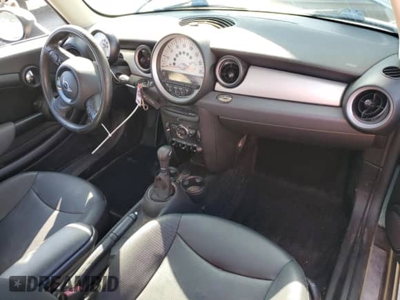 2011 MINI Hardtop with VIN WMWSU3C52BT253034, listed as a Copart auction lot 90109305 with 50,636 mi miles and Salvage title. Bid and sale history available at DreamBid. Image 8.