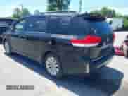 2013 Toyota Sienna XLE with VIN 5TDDK3DC0DS051969, listed as a IAAI auction lot 42344494 with 166,890 mi miles and . Bid and sale history available at DreamBid. Image 3.