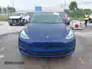 2022 Tesla Model Y Long Range z VIN 7SAYGAEE1NF399523, wystawiony jako IAAI lot #43175077 z przebiegiem 115 467 mil mil oraz . Historia ofert i sprzedaży dostępna na DreamBid. Obrazek 13.