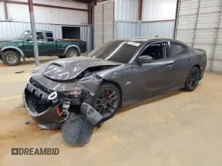 2021 Dodge Charger Scat Pack with VIN 2C3CDXGJ8MH578023, listed as a Copart auction lot 80670845 with 59,546 mi miles and Salvage title. Bid and sale history available at DreamBid. Image 1.