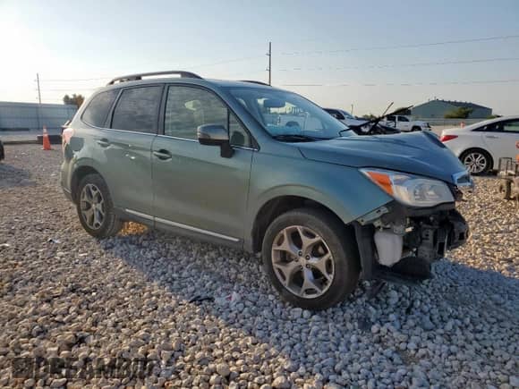 2016 Subaru Forester Touring with VIN JF2SJAXC1GH410511, listed as a Copart auction lot 68792995 with 146,911 mi miles and Salvage title. Bid and sale history available at DreamBid. Image 4.