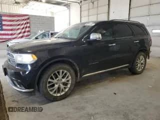 2014 Dodge Durango Citadel with VIN 1C4RDJEG1EC345292, listed as a Copart auction lot 80712465 with 124,016 mi miles and Salvage title. Bid and sale history available at DreamBid. Image 1.