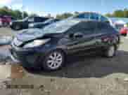 2012 Ford Fiesta SE with VIN 3FADP4BJ4CM114102, listed as a Copart auction lot 81820825 with 104,879 mi miles and Salvage title. Bid and sale history available at DreamBid. Image 1.