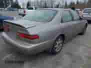 1997 Toyota Camry LE z VIN 4T1BF22K7VU035485, wystawiony jako IAAI lot #41896227 z przebiegiem 254 139 mil mil oraz . Historia ofert i sprzedaży dostępna na DreamBid. Obrazek 4.