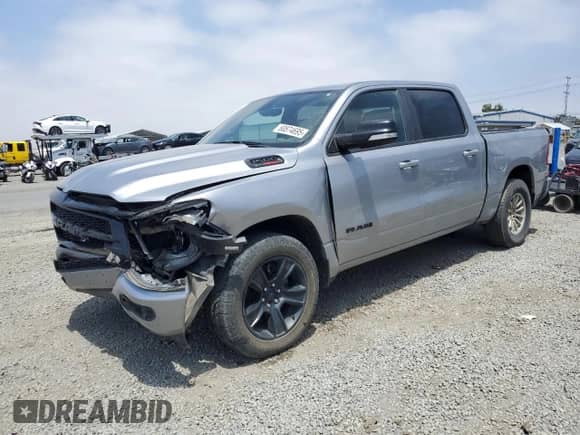 2021 Ram 1500 Big Horn with VIN 1C6RREFM7MN795066, listed as a Copart auction lot 60874695 with 101,089 mi miles and Salvage title. Bid and sale history available at DreamBid. Image 1.