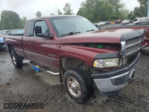 2002 Dodge 2500 with VIN 3B7KF23672M285170, listed as a Copart auction lot 58813165 with 139,892 mi miles and Salvage title. Bid and sale history available at DreamBid. Image 4.