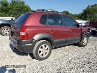 2005 Hyundai Tucson GLS with VIN KM8JN12D65U181029, listed as a Copart auction lot 68954495 with 218,217 mi miles and Salvage title. Bid and sale history available at DreamBid. Image 3.