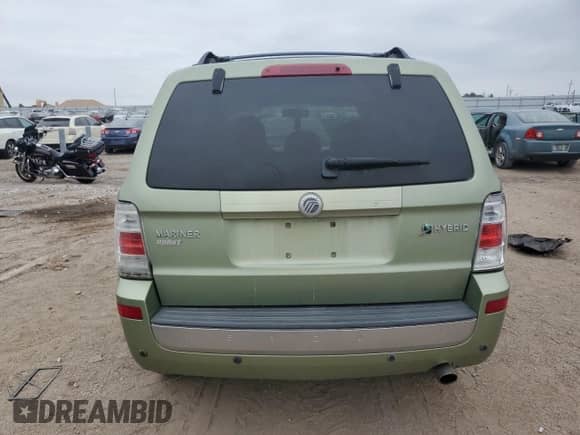 2009 Mercury Mariner Hybrid with VIN 4M2CU29379KJ13787, listed as a Copart auction lot 70720545 with 149,923 mi miles and Salvage title. Bid and sale history available at DreamBid. Image 6.