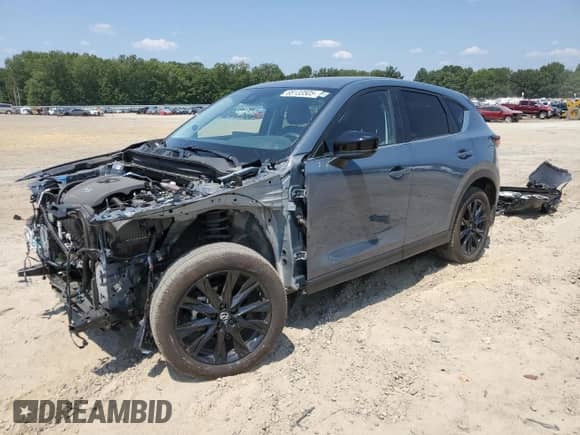 2023 Mazda CX-5 S Carbon Edition z VIN JM3KFBCM0P0291442, wystawiony jako Copart lot #68133505 z przebiegiem 5 593 mil mil oraz Szkoda całkowita • Salvage title. Historia ofert i sprzedaży dostępna na DreamBid. Obrazek 1.