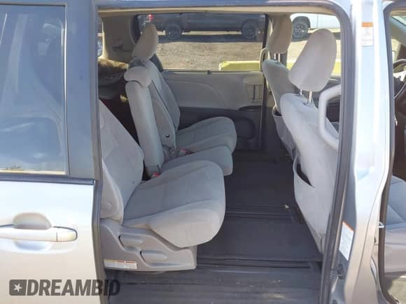 2015 Toyota Sienna LE AAS with VIN 5TDKK3DCXFS644118, listed as a IAAI auction lot 42897067 with 332,144 mi miles and . Bid and sale history available at DreamBid. Image 8.