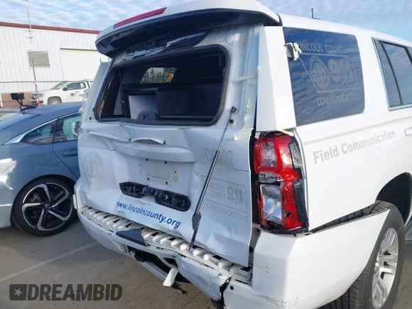 2018 Chevrolet Tahoe Commercial z VIN 1GNSKFECXJR201692, wystawiony jako IAAI lot #41606352 z przebiegiem 36 882 mil mil oraz . Historia ofert i sprzedaży dostępna na DreamBid. Obrazek 18.