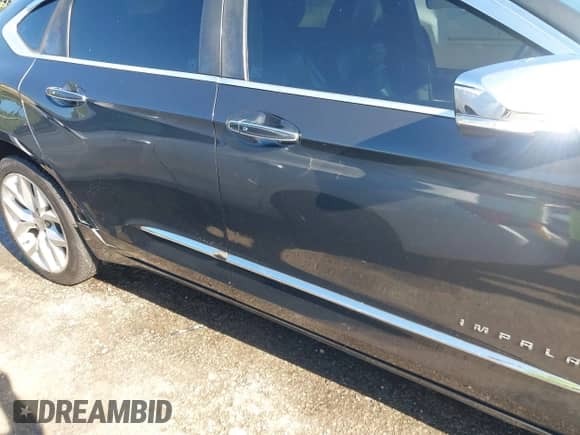 2015 Chevrolet Impala LTZ with VIN 2G1165S34F9130927, listed as a IAAI auction lot 42796398 with 151,694 mi miles and . Bid and sale history available at DreamBid. Image 6.