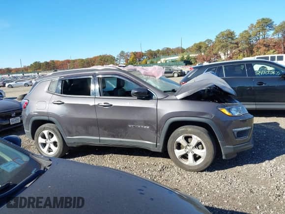 2021 Jeep Compass Latitude with VIN 3C4NJDBB8MT537958, listed as a IAAI auction lot 40705924 with 73,319 mi miles and . Bid and sale history available at DreamBid. Image 14.