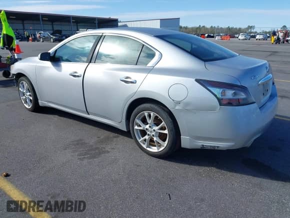 2013 Nissan Maxima SV z VIN 1N4AA5AP9DC819190, wystawiony jako IAAI lot #41749681 z przebiegiem 186 784 mil mil oraz . Historia ofert i sprzedaży dostępna na DreamBid. Obrazek 3.