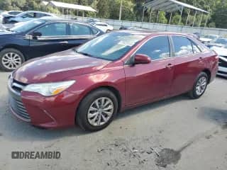 2017 Toyota Camry LE with VIN 4T1BF1FK4HU727437, listed as a Copart auction lot 81623515 with 124,472 mi miles and Salvage title. Bid and sale history available at DreamBid. Image 1.