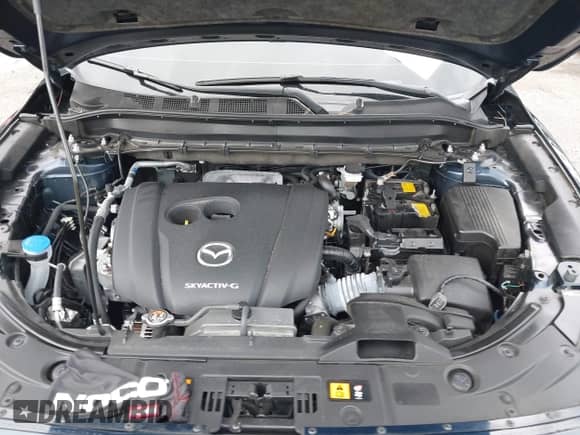2023 Mazda CX-5 S Preferred z VIN JM3KFBCMXP0209359, wystawiony jako IAAI lot #42724622 z przebiegiem 14 682 mil mil oraz . Historia ofert i sprzedaży dostępna na DreamBid. Obrazek 10.