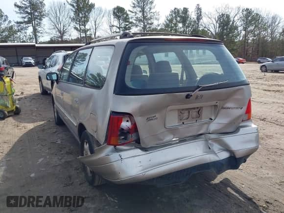 1996 Honda Odyssey EX with VIN JHMRA1871TC009318, listed as a IAAI auction lot 41463600 with 148,836 mi miles and . Bid and sale history available at DreamBid. Image 6.