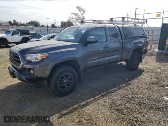 2018 Toyota Tacoma SR5 with VIN 5TFRZ5CN2JX063112, listed as a Copart auction lot 79125934 with 93,487 mi miles and Non repairable. Bid and sale history available at DreamBid. Image 1.