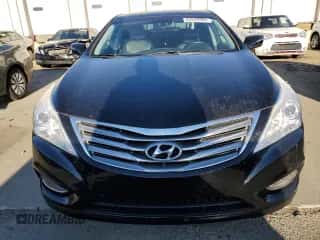 2013 Hyundai Azera с VIN KMHFH4JG2DA204770, выставлен на аукционе Copart как лот 82849384 с пробегом 88 246 миль миль и Списание • Salvage title. История ставок и продаж доступна на DreamBid. Изображение 5.