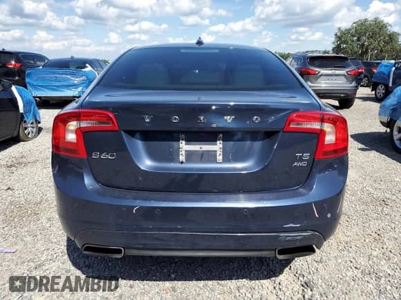 2015 Volvo S60 T5 Premier с VIN YV1612TK7F1334510, выставлен на аукционе Copart как лот 69535785 с пробегом 141 485 миль миль и Списание • Salvage title. История ставок и продаж доступна на DreamBid. Изображение 6.