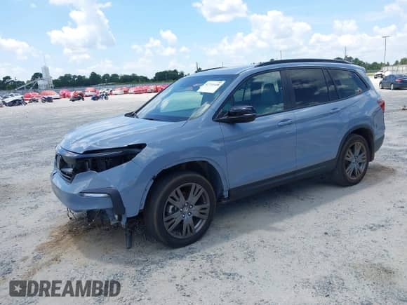 2022 Honda Pilot Sport z VIN 5FNYF5H33NB026470, wystawiony jako IAAI lot #42731448 z przebiegiem 60 018 mil mil oraz . Historia ofert i sprzedaży dostępna na DreamBid. Obrazek 18.