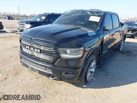2021 Ram 1500 Laramie with VIN 1C6RREJT1MN710141, listed as a IAAI auction lot 41247763 with Not provided miles and . Bid and sale history available at DreamBid. Image 2.