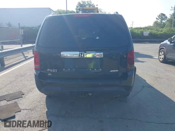 2013 Honda Pilot EX-L with VIN 5FNYF4H65DB060543, listed as a IAAI auction lot 42380911 with 330,452 mi miles and . Bid and sale history available at DreamBid. Image 17.